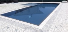 pavimento in palladiana di marmo bianco carrara e bardiglio esterno piscina